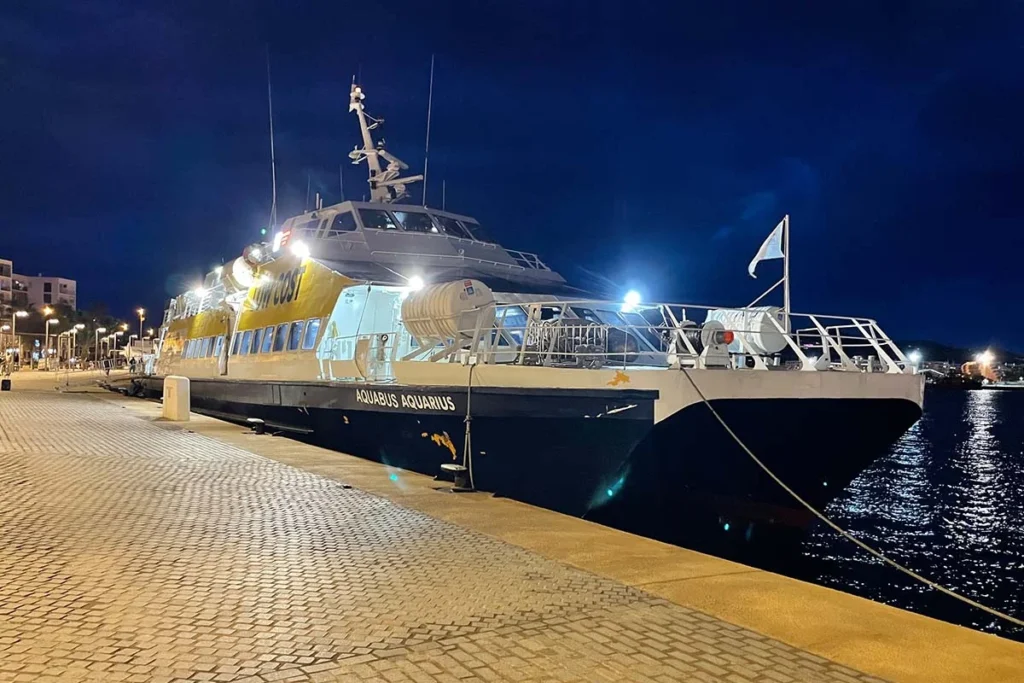 Aquabus ferry in Formentera port at night